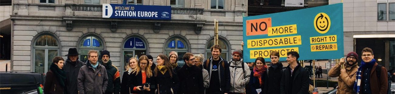 Right to Repair activists standing outside the European Parliament